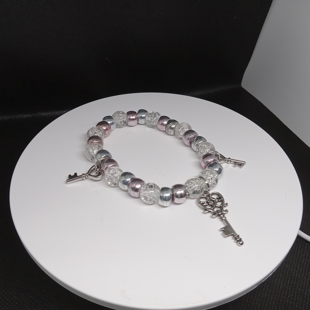 Elegant Silver and Pink Beaded Bracelet with Key Charms
